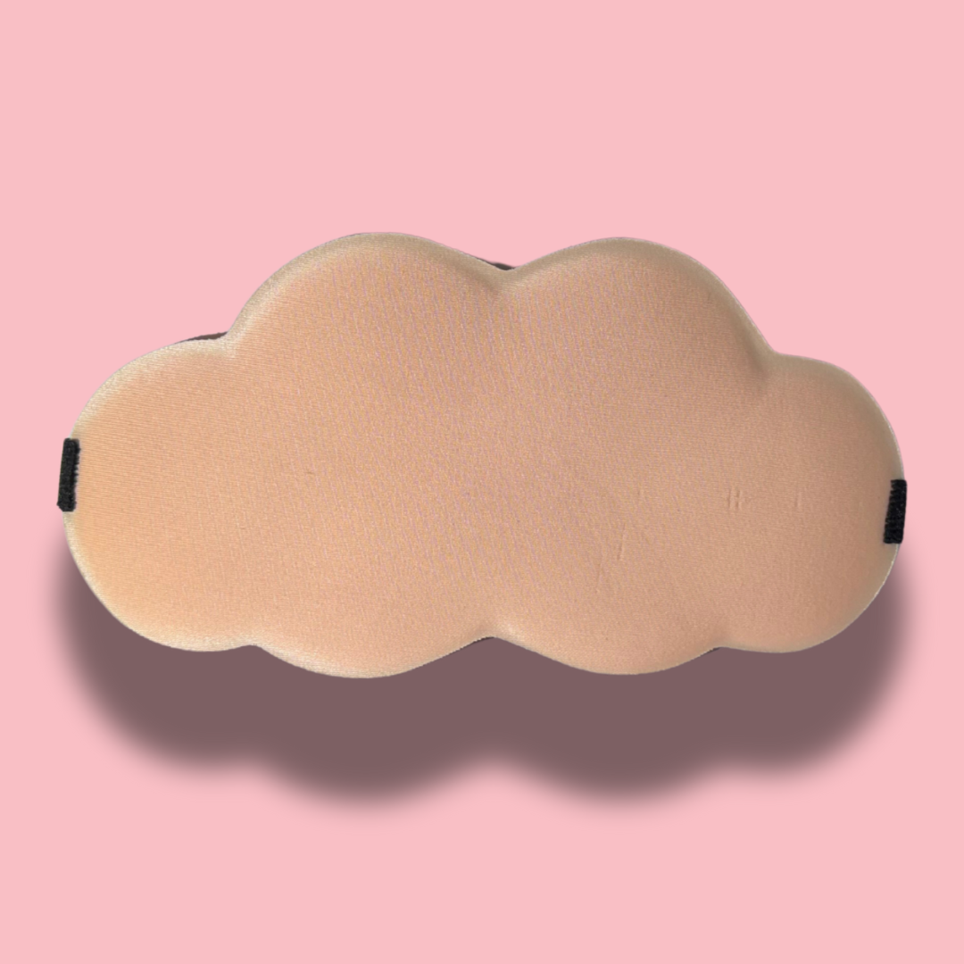 Ballerina pink cloud-shaped pillow on a pink background