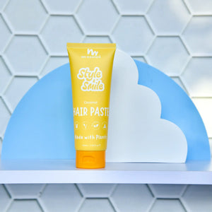 Tube of hair paste with 'Style Smile' branding on a geometric background