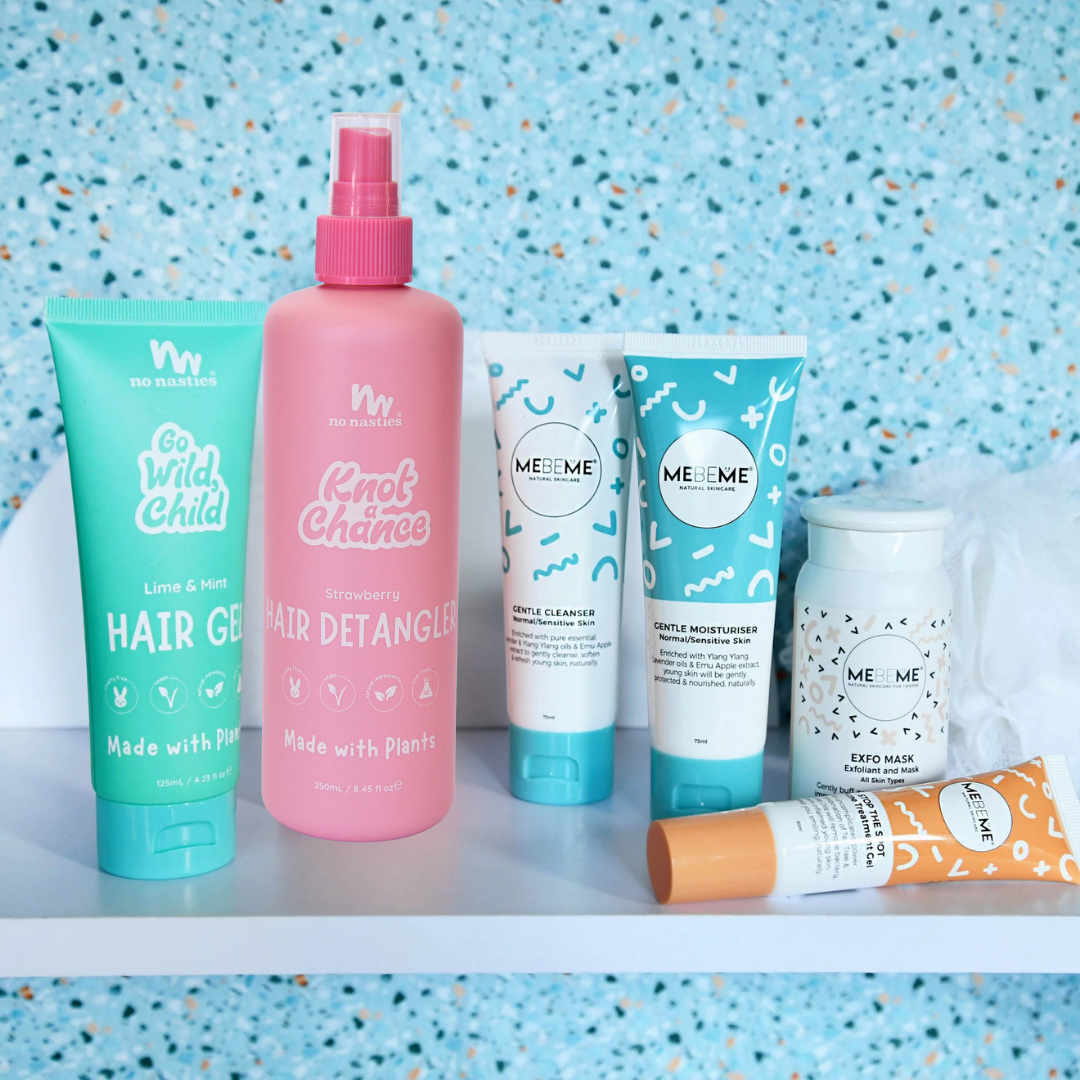 Set of MEBEME tween skincare and No Nasties hair care products on a shelf with a blue speckled background