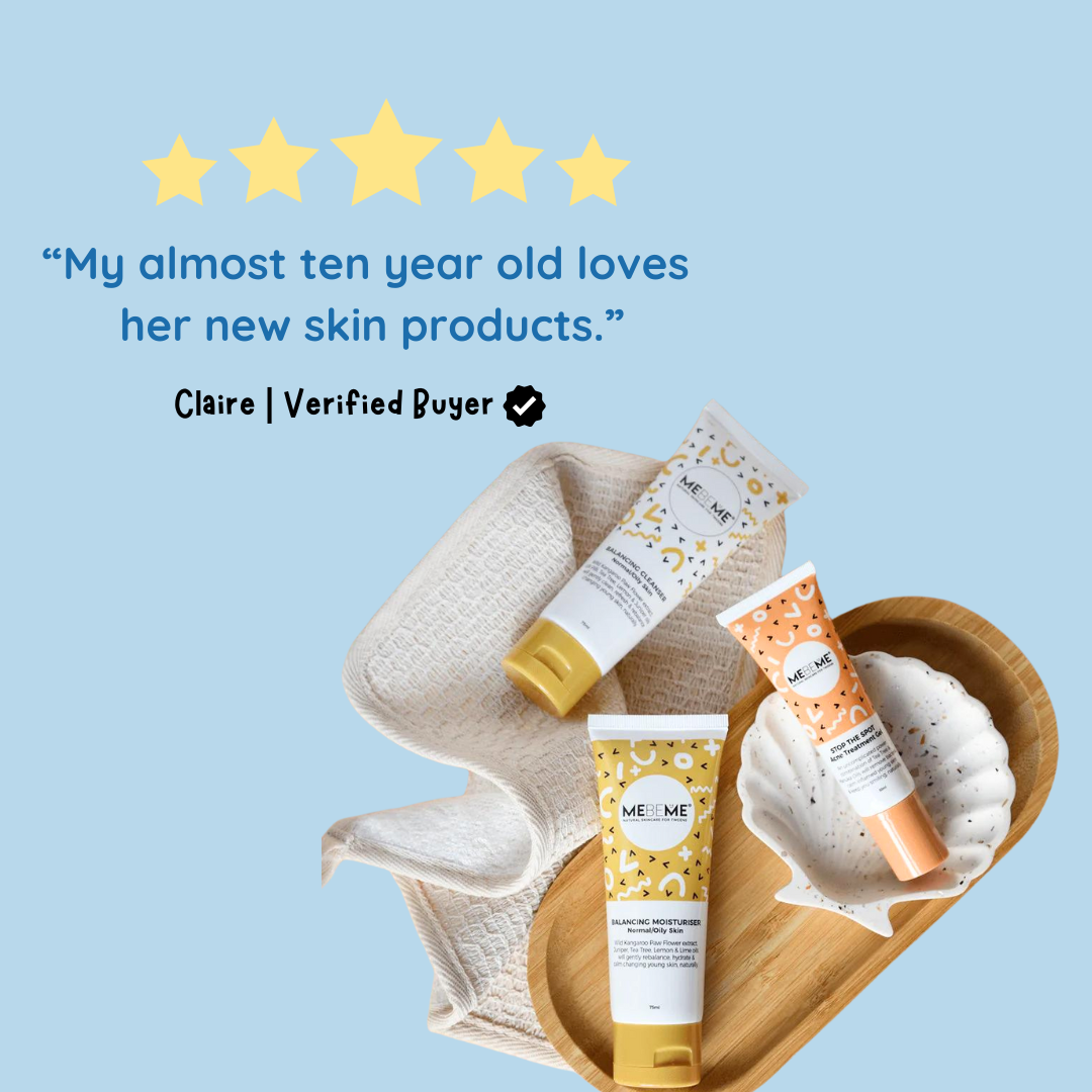 natural balancing cleanser moisturiser and acne gel on orange background