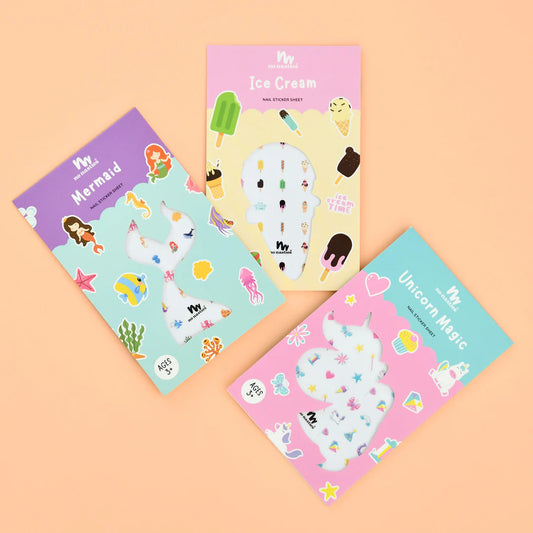 Three sticker books with mermaid, ice cream, and unicorn designs on a peach background