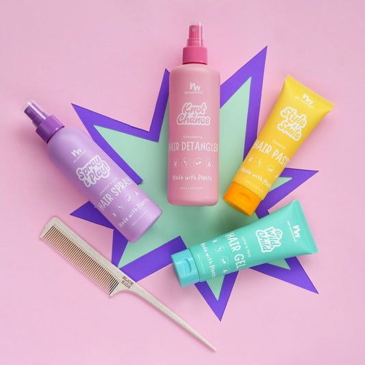 Set of No Nasties Kids NZ hair care products including spray, gel, and comb on an orange background