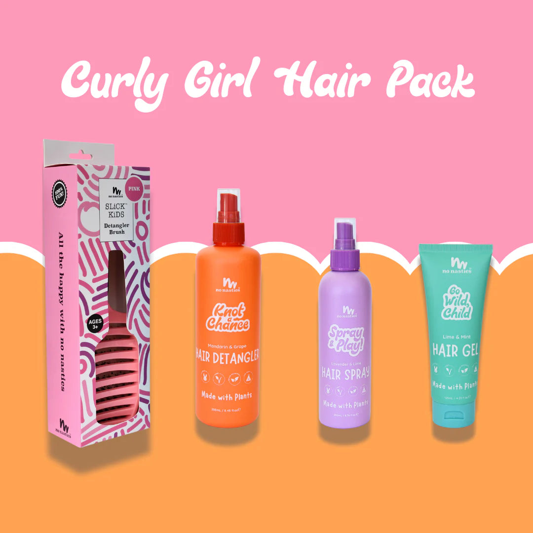 Curly Girl Hair Pack with hair care products on a pink and orange background