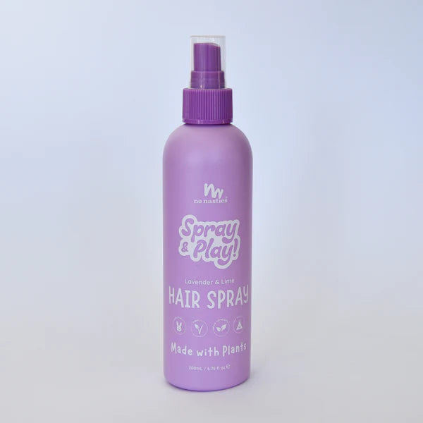 Purple hair spray bottle with &#39;Spray &amp; Play&#39; text on a light purple background