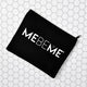Black toiletry bag with MEBEME written in white on a white and grey background