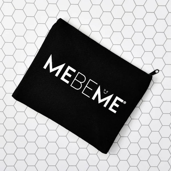 Black toiletry bag with MEBEME written in white on a white and grey background
