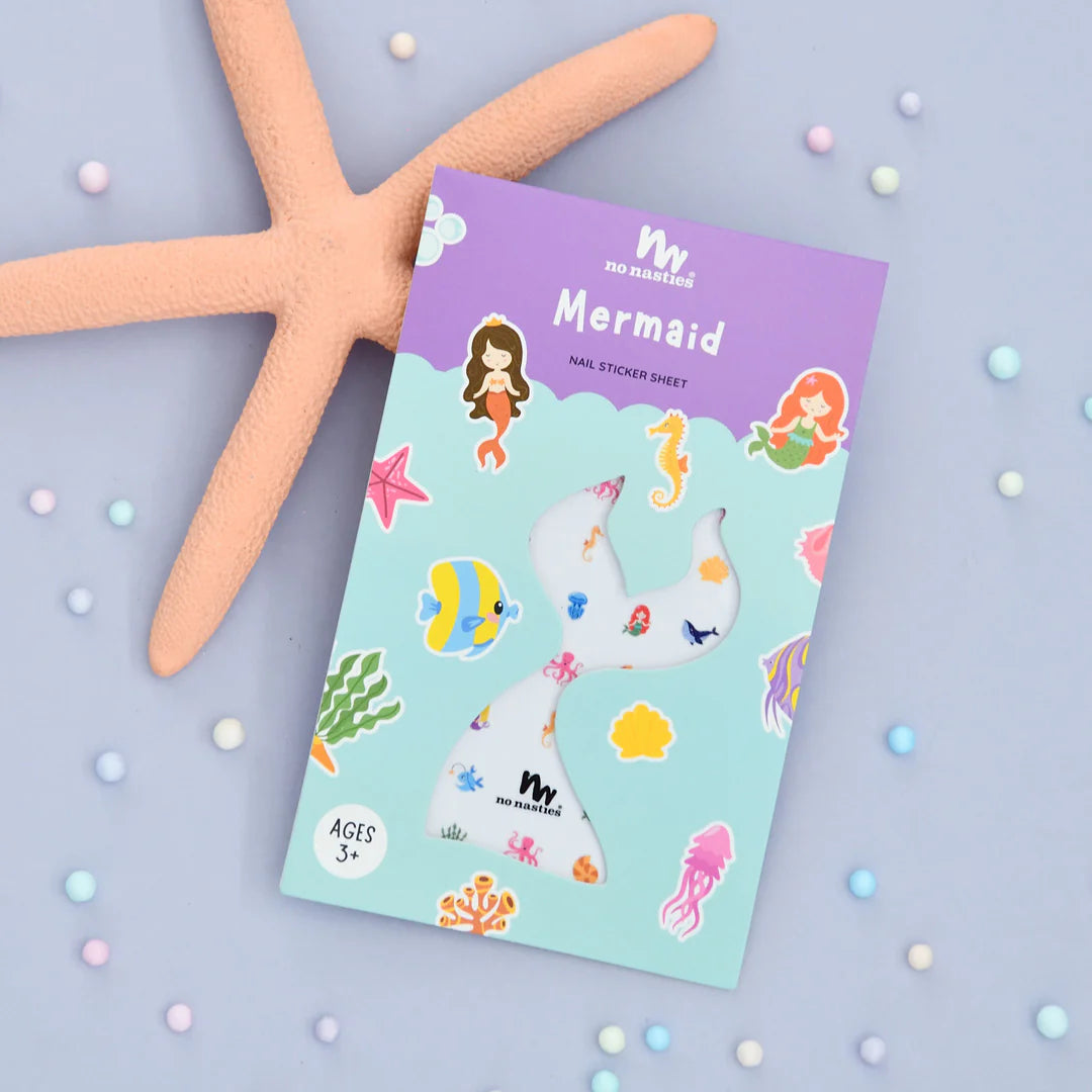 Mermaid themed nail sticker sheet packaging on a light purple background with starfish and polka dots.