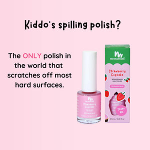 No Nasties Strawberry Cupcake scented  nail polish bottle and its packaging box on a light pink background with promotional text.