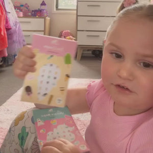 Little girl with nail stickers
