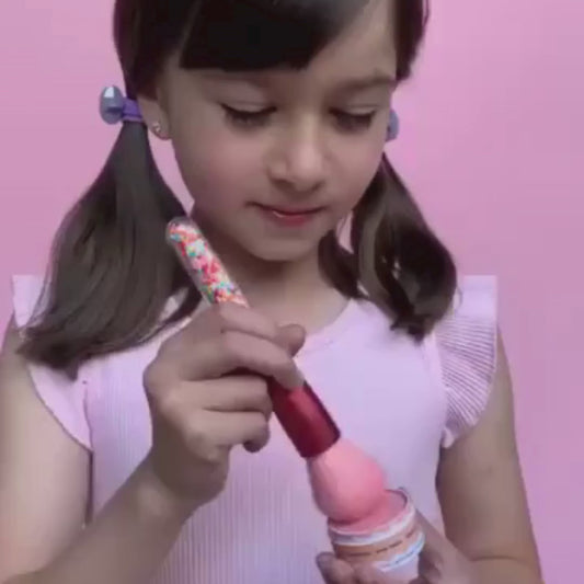 Award winning Kids pressed eyeshadow set on pink background