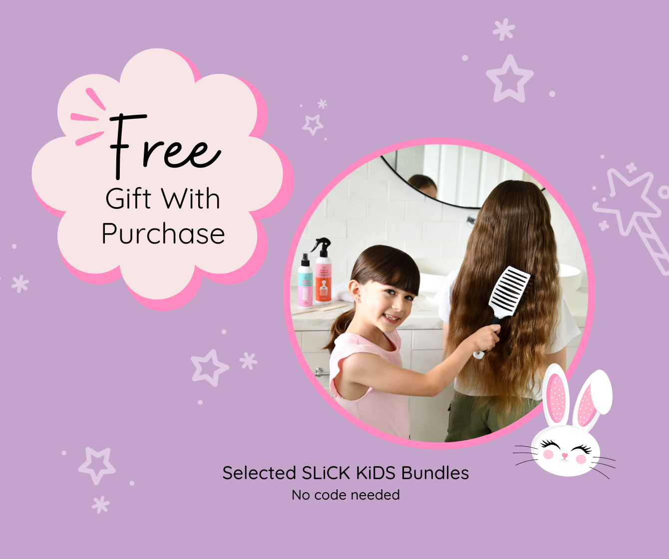 little girl brushing another girls hair using natural hair products