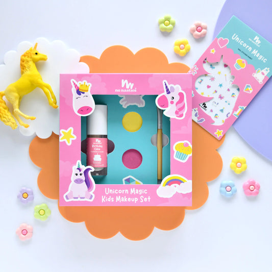 Unicorn-themed kids makeup set with accessories on a colorful background