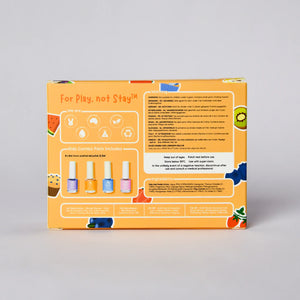 The back of a kids' nail polish combo pack box, showing product details, instructions, and illustrations of various fruits and desserts on a light gray background.