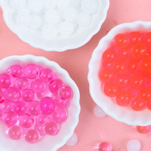 Water beads NZ red white and pink in bowls