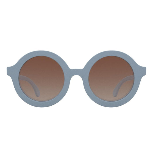 Babiators round sunglasses on girl with dark hair