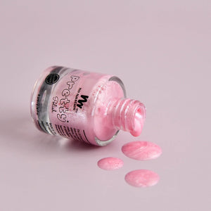 Pink kids nail polish water based open bottle