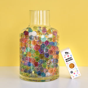 Expanded water beads in rainbow colours