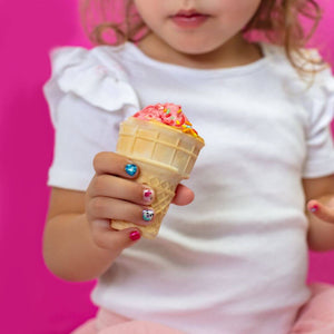 cute-little-girl-holding-ice-cream-cone-wearing-nail-stickers